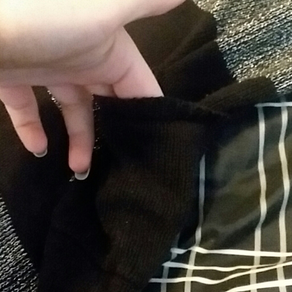 A knitted half dress with pockets - Picture 2 of 2